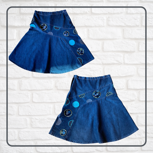 Upcycled denim A-line skirt with circle appliqués